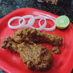A picture of Roasted chicken in Pan.