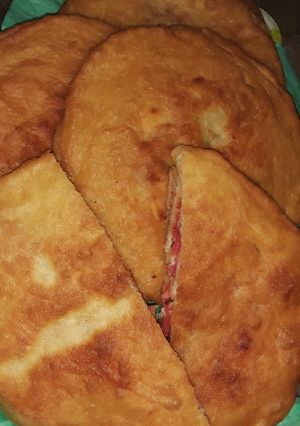 صورة لوصفة البيتزا 🍕🍕 المغلية بدون فرن لذيذة وسهلة التحضير