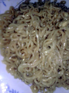 A picture of cheesy beef noodles.