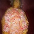 Góndola de piña rellena de cóctel de marisco