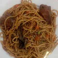 A picture of Zee's Spaghetti with Chicken and dry fish.