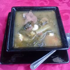 A picture of Vegetable soup with beef.