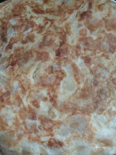 Una foto de Tortilla de Patata con cebolla