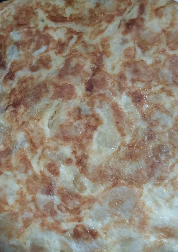 Una foto de Tortilla de Patata con cebolla