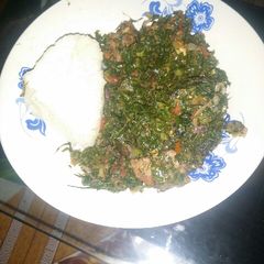 Fried sukuma wiki and beef A picture of Fried sukuma wiki and beef.