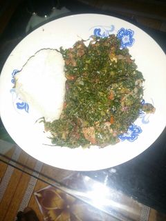 A picture of Fried sukuma wiki and beef.