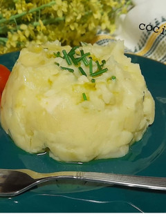 Una foto de Puré de patatas con col y queso