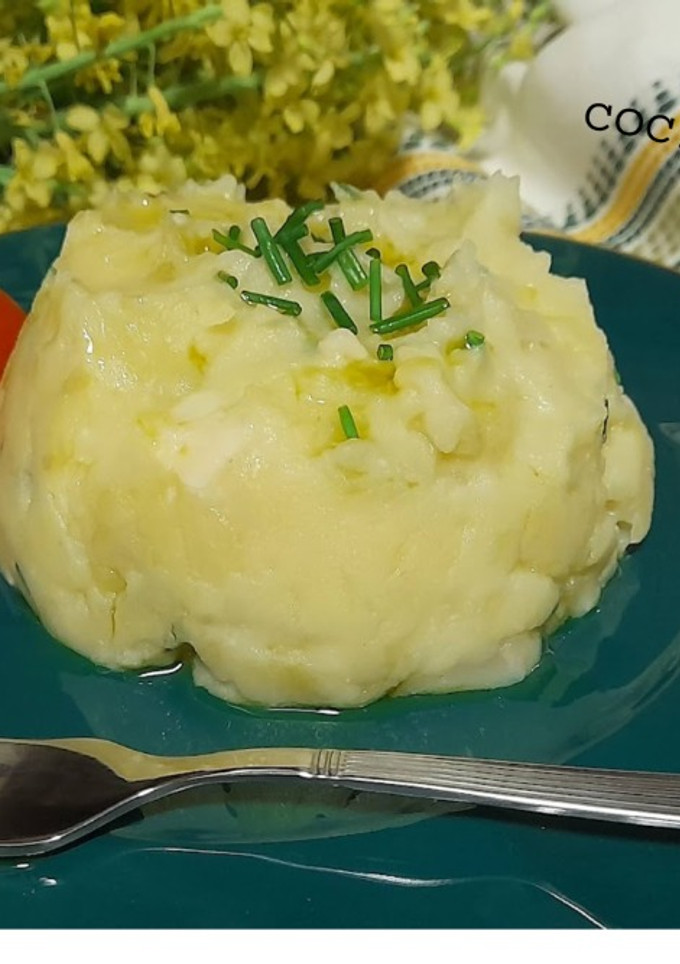 Una foto de Puré de patatas con col y queso