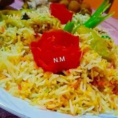 A picture of شاہی رنگین بریانی.