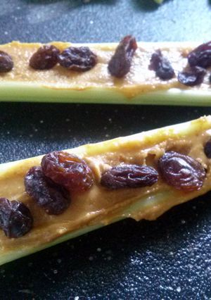 A picture of Ants on a log.