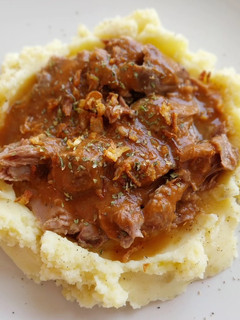 Foto principal de Carrilleras en salsa al toque de chocolate con puré