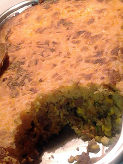 A picture of cheesy cornbread beef pot pie.