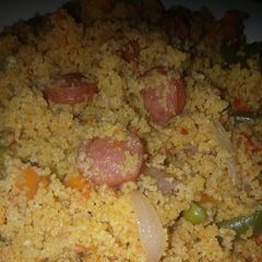 A picture of Couscous with sausage.