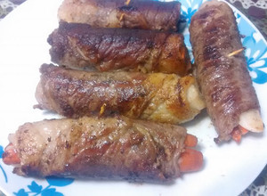 Una foto de Rollitos de milanesa de res con zanahoria y cebolla 🍴