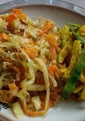 A picture of Tuna Cabbage and potatoes fries.