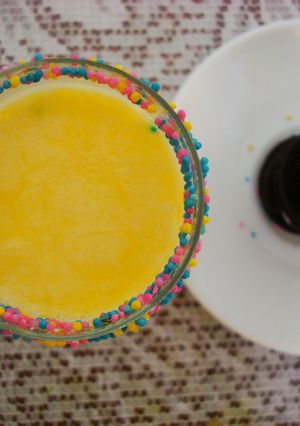 A picture of Vanilla Milk Shots with Sprinkles.