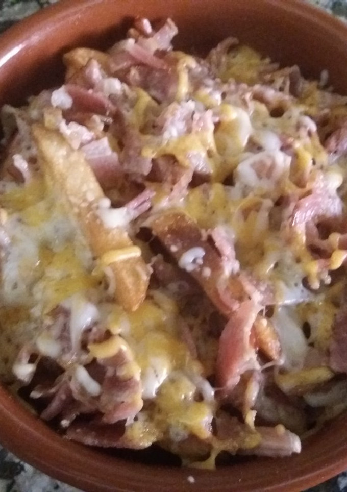 Una foto de Patatas con bacon y queso