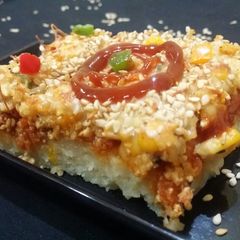 A picture of Baked Sesame Cheesey Potato stuffed pie.