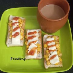 A picture of Cheese Corn Open Toast.