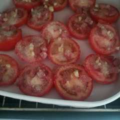 Una foto de Tomates al horno