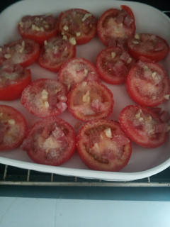 Una foto de Tomates al horno