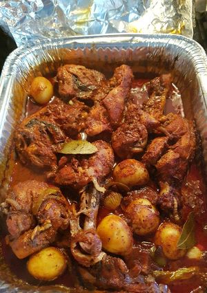 Una foto de Pollo con jugo al horno