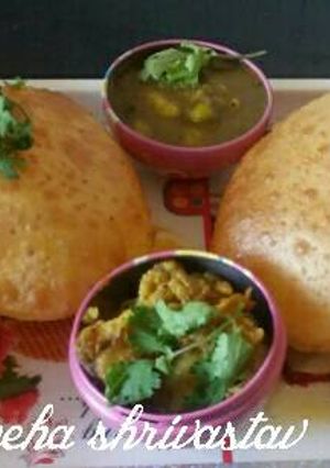A picture of Besan masala poori...with Gobhi fry and aloo curry.