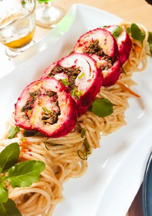 A picture of Hakka Noodles with Chicken Swirls.