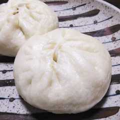A picture of Nikuman (Steamed Pork Buns).