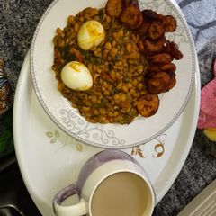 Beans porridge paired with plantain and boiled eggs A picture of Beans porridge paired with plantain and boiled eggs.