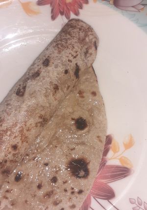 A picture of Ghee cheeni roti roll.