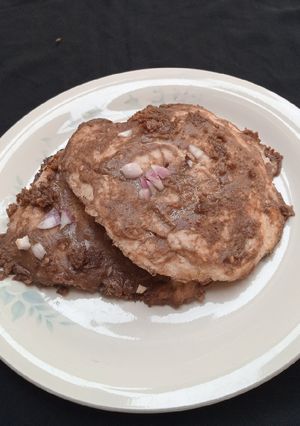A picture of Gurasa (bread) with quli quli.
