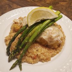 A picture of Brad's crab stuffed chicken roulade w/ tomato basil risotto.