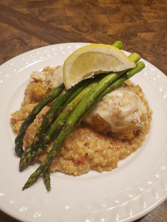 A picture of Brad's crab stuffed chicken roulade w/ tomato basil risotto.