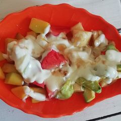 A picture of Fruit salad in yogurt and honey#4weekschallenge.