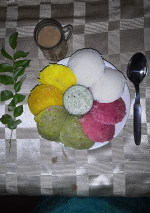 A picture of Steamed Colour Rice Idlis.