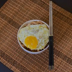 A picture of Leftover Fried Chicken on Rice.