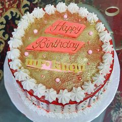 A picture of Red velvet cake with white chocolate cream cheese frosting.