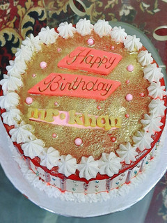 A picture of Red velvet cake with white chocolate cream cheese frosting.