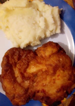 Una foto de Pollo frito con costra