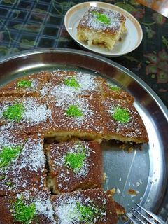 صورة لوصفة معمول بالقشطه بالصينيه
