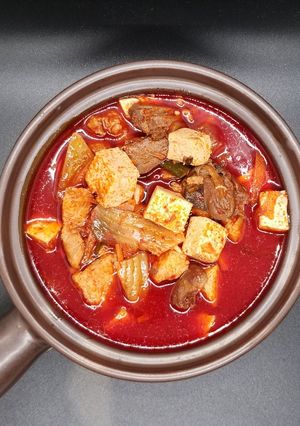 A picture of Sundubu-jjigae (Korean Spicy Tofu Stew).