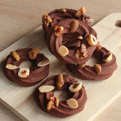 A picture of Christmas Wreath Cookies [Chocolate Spritz].