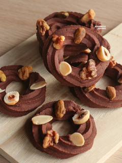 A picture of Christmas Wreath Cookies [Chocolate Spritz].