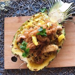 A picture of The BEST Pineapple Fried Rice Recipe in a Pineapple Bowl •How to Make Pineapple Bowl |ThaiChef Food.