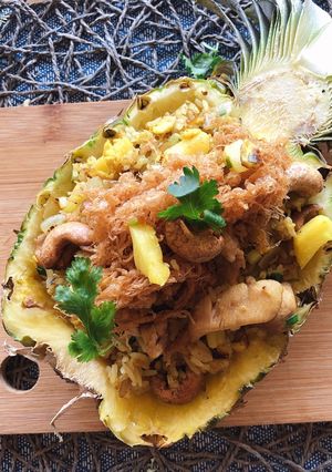 A picture of The BEST Pineapple Fried Rice Recipe in a Pineapple Bowl •How to Make Pineapple Bowl |ThaiChef Food.