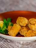 Olive Ripiene di Tonno con Gratinatura di Legumi al Forno