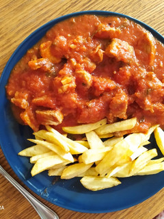 Una foto de Magro de cerdo con tomate