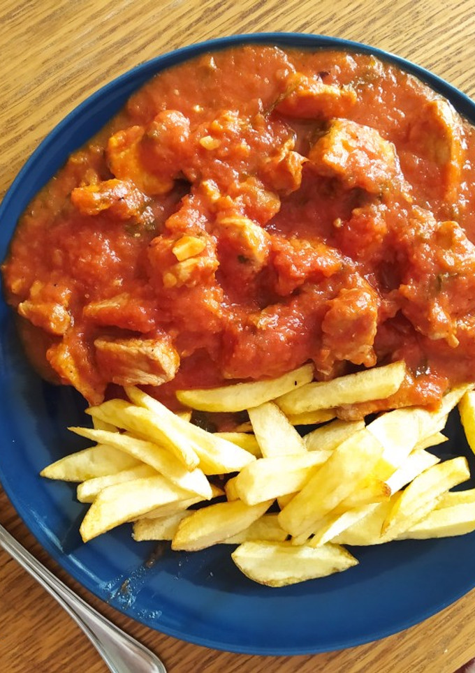 Una foto de Magro de cerdo con tomate