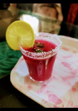 A picture of Pomegranate Mint margarita.